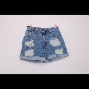 Distressed high rise Levi shorts
